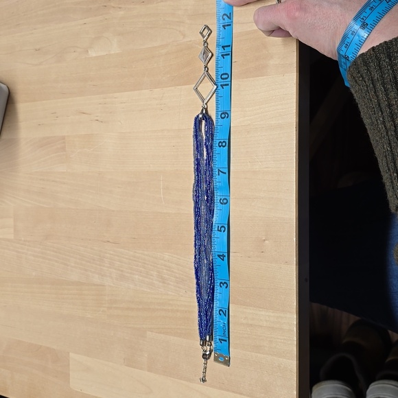 Elegant Blue Beaded Necklace with Geometric Pendant - Picture 11 of 11